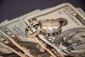 Wedding rings and large bills of money
