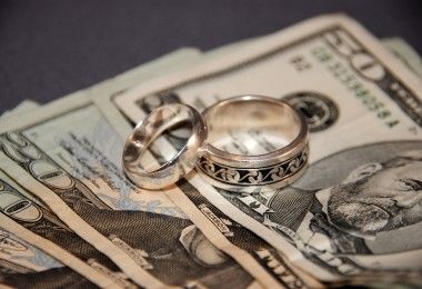 Wedding rings and large bills of money