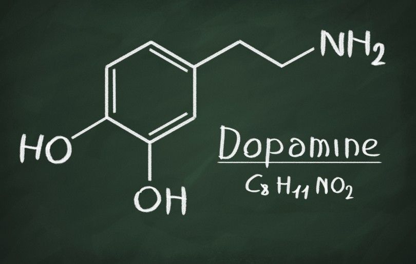 Chemical formula of Dopamine on a blackboard